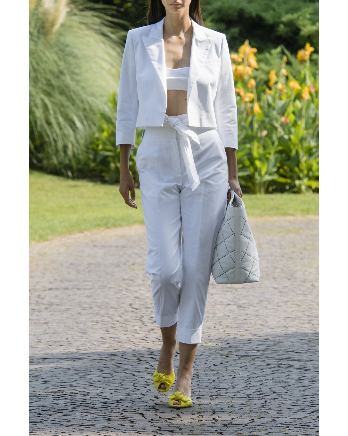 High-waisted belted white pants | | Genny