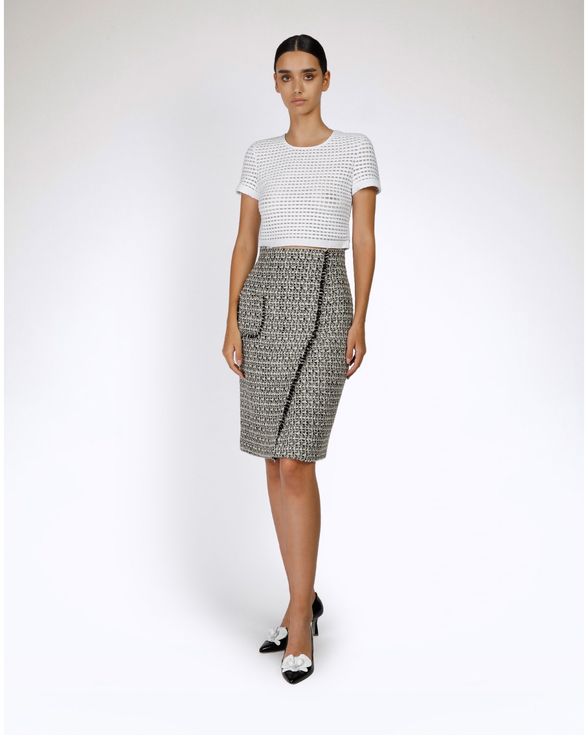 White jacquard lamé-trimmed skirt | | Genny