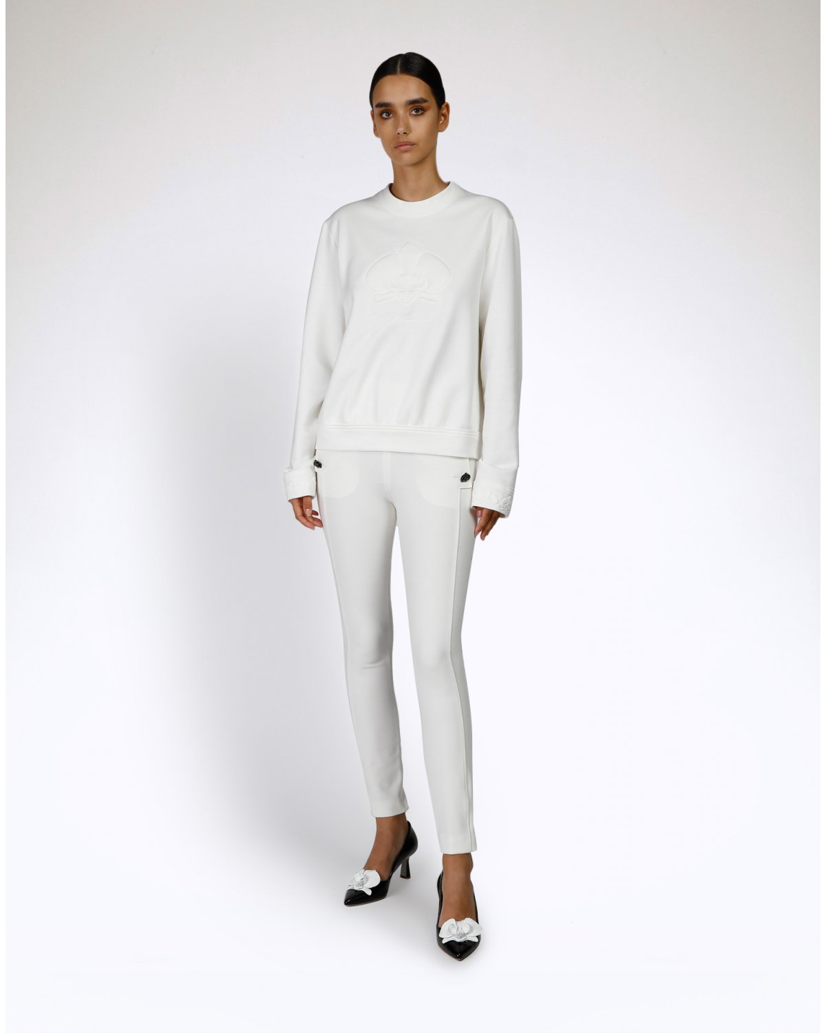 White orchid embossed sweater | | Genny