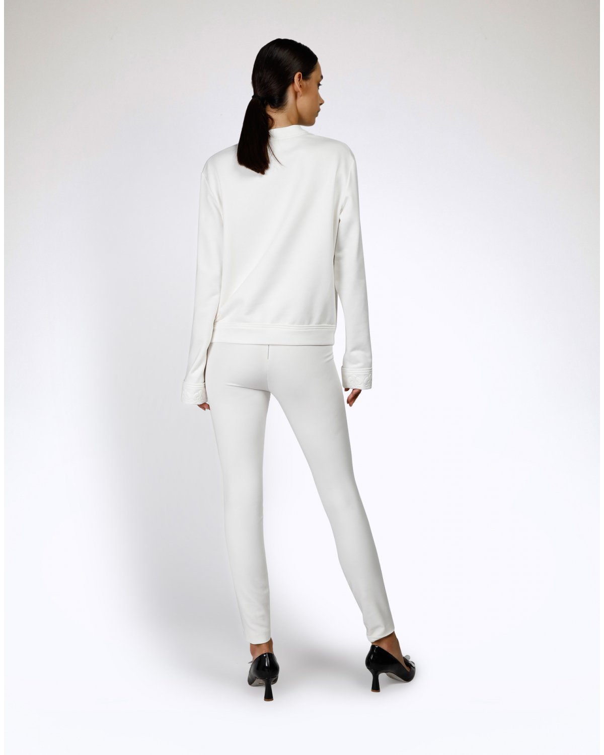 White orchid embossed sweater | | Genny
