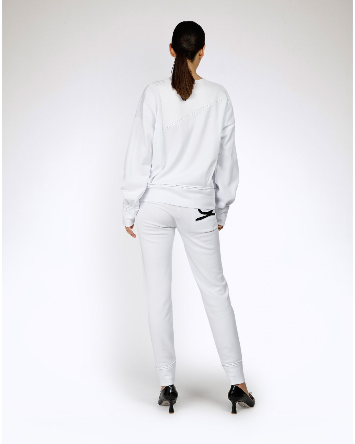 Pantaloni bianchi con dettaglio ricamato | | Genny