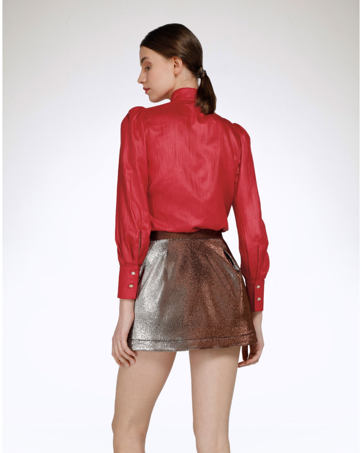 Red crinkled shirt with puffball sleeves | | Genny
