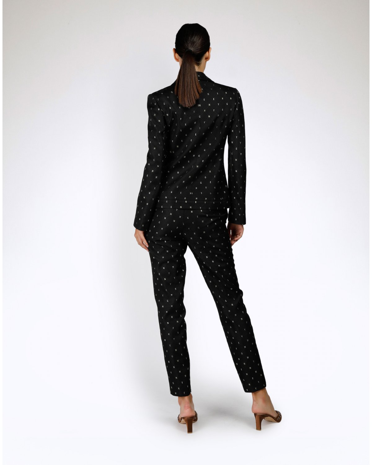 Black jacquard high-rise trousers | | Genny
