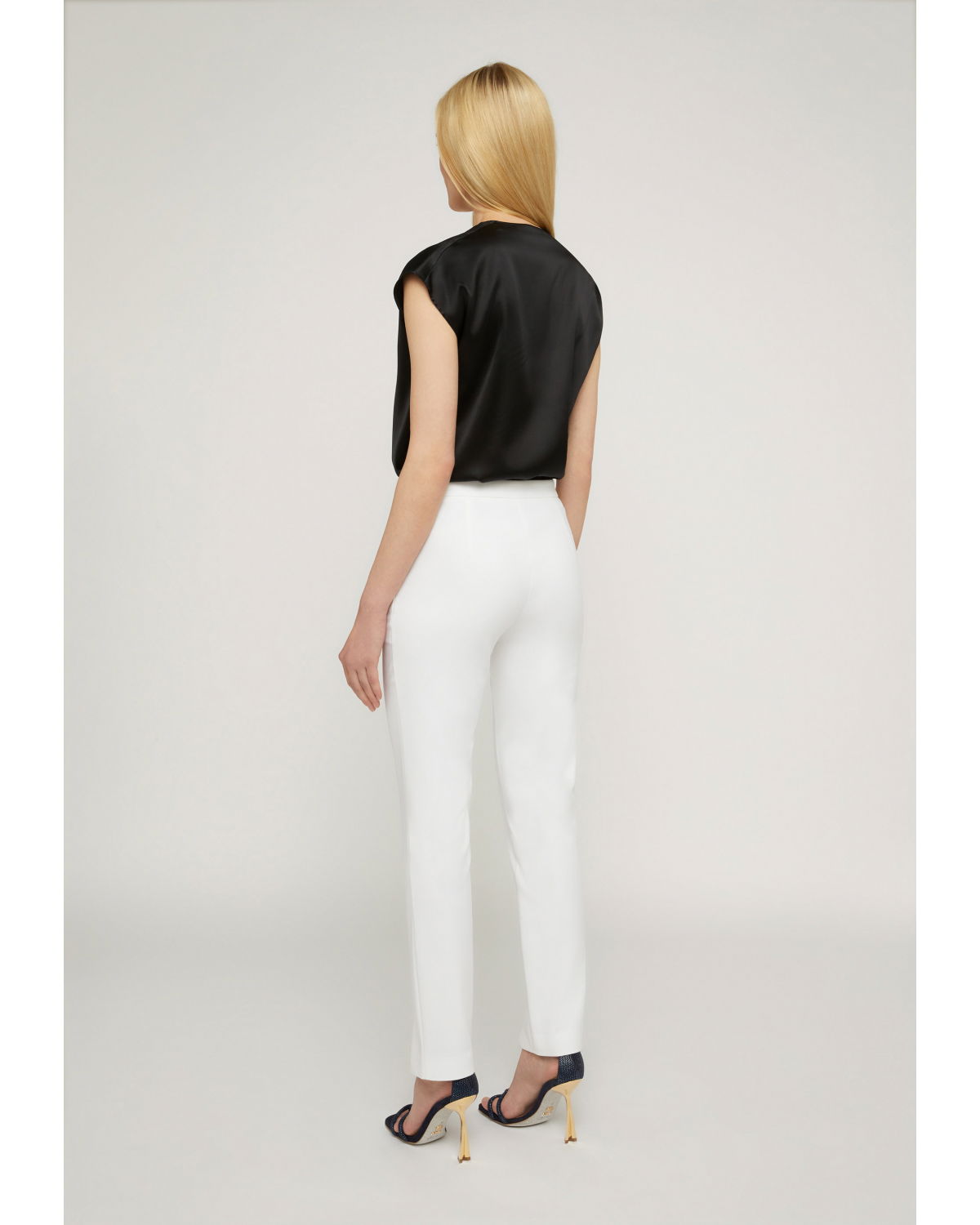 Split front slim trousers | | Genny
