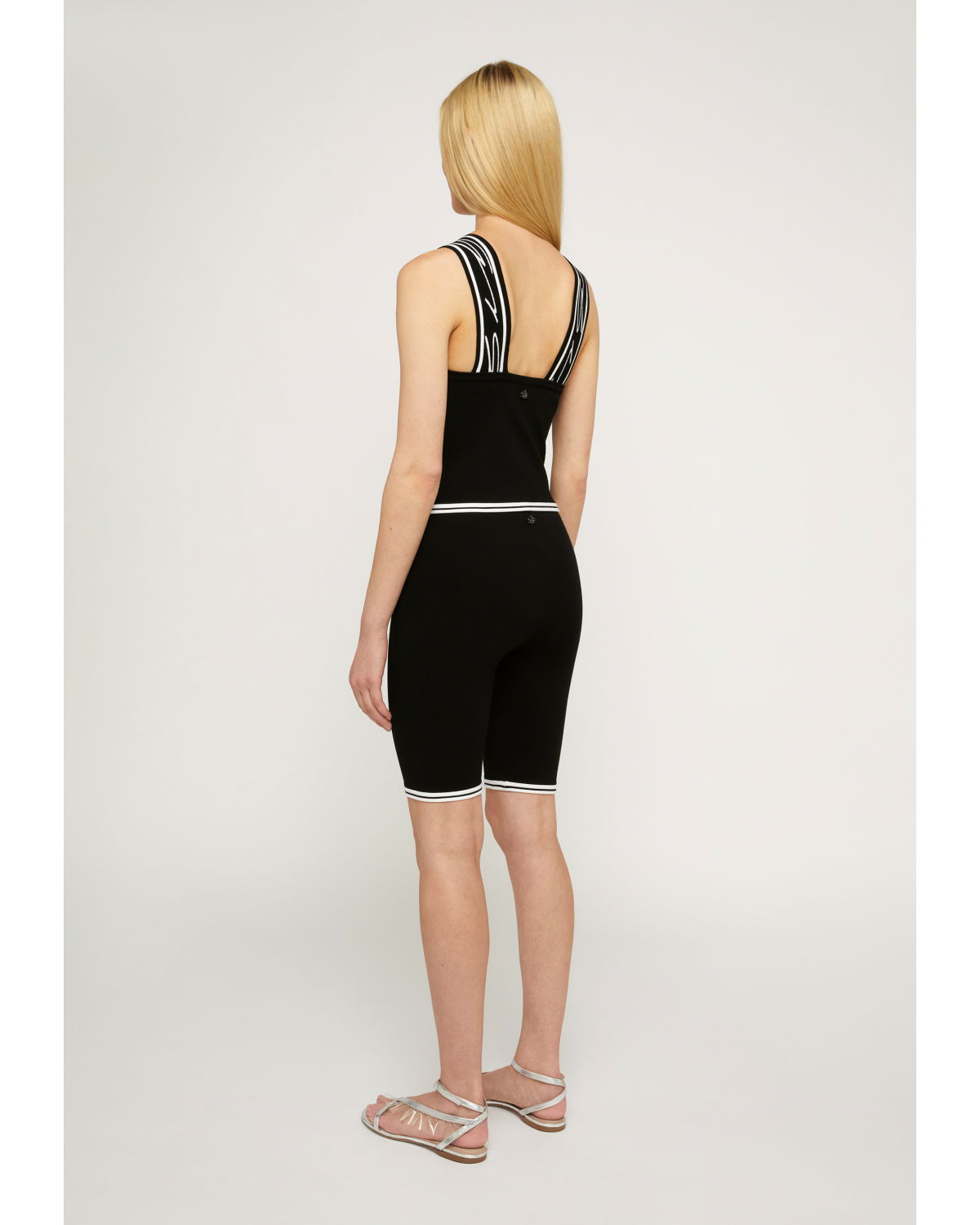 Black top with logo band | | Genny