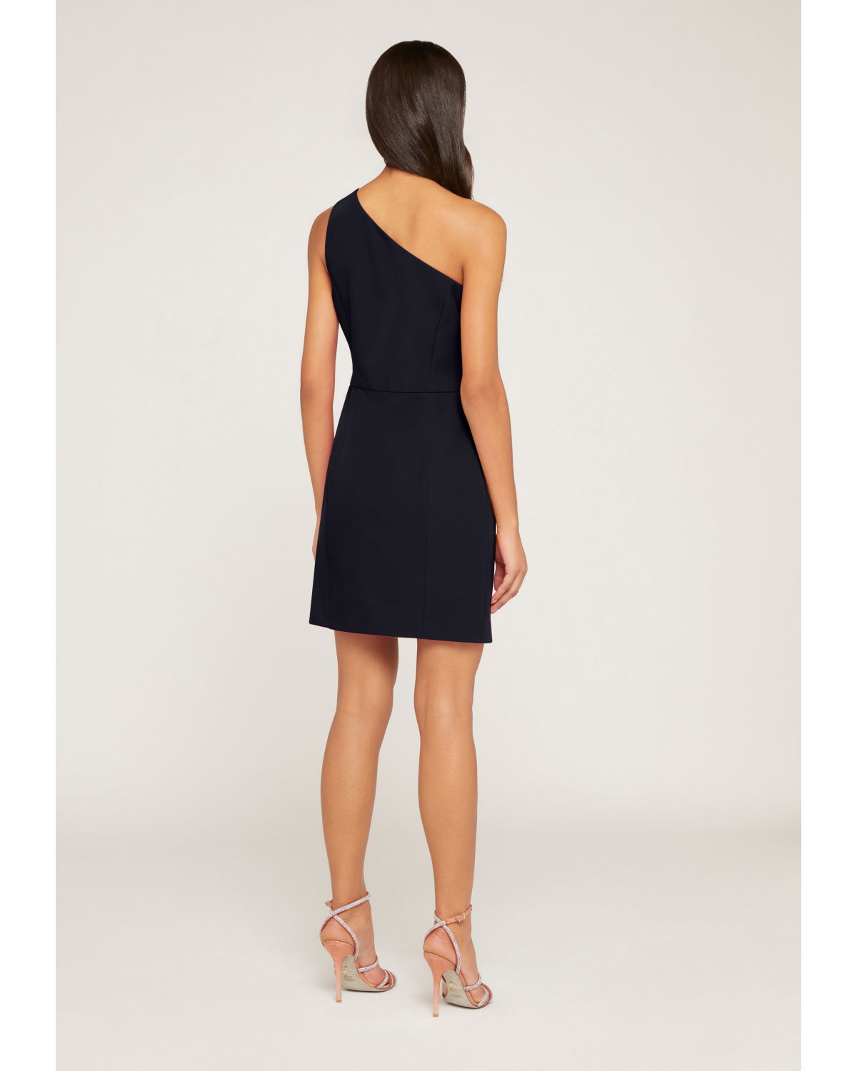 One-shoulder black dress with bow | | Genny