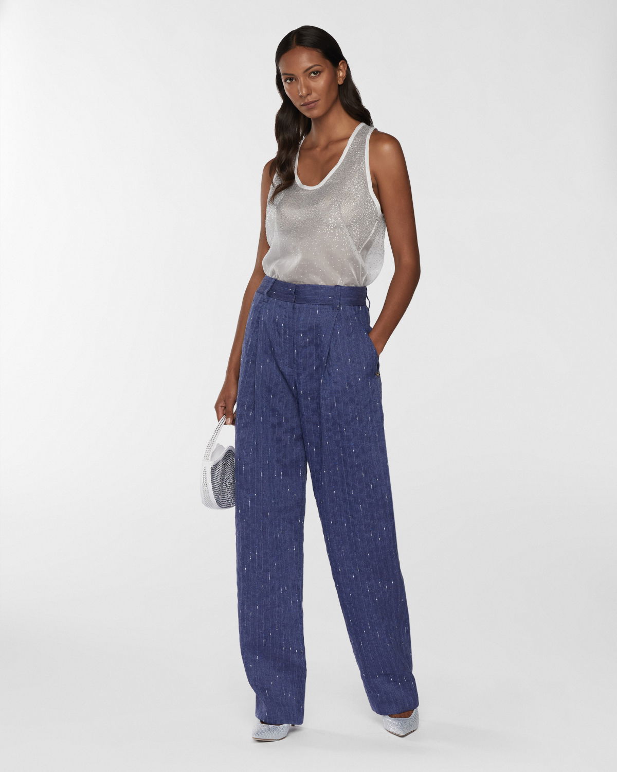 Pinstriped linen-blend pants | Resort 2025 Collection | Genny