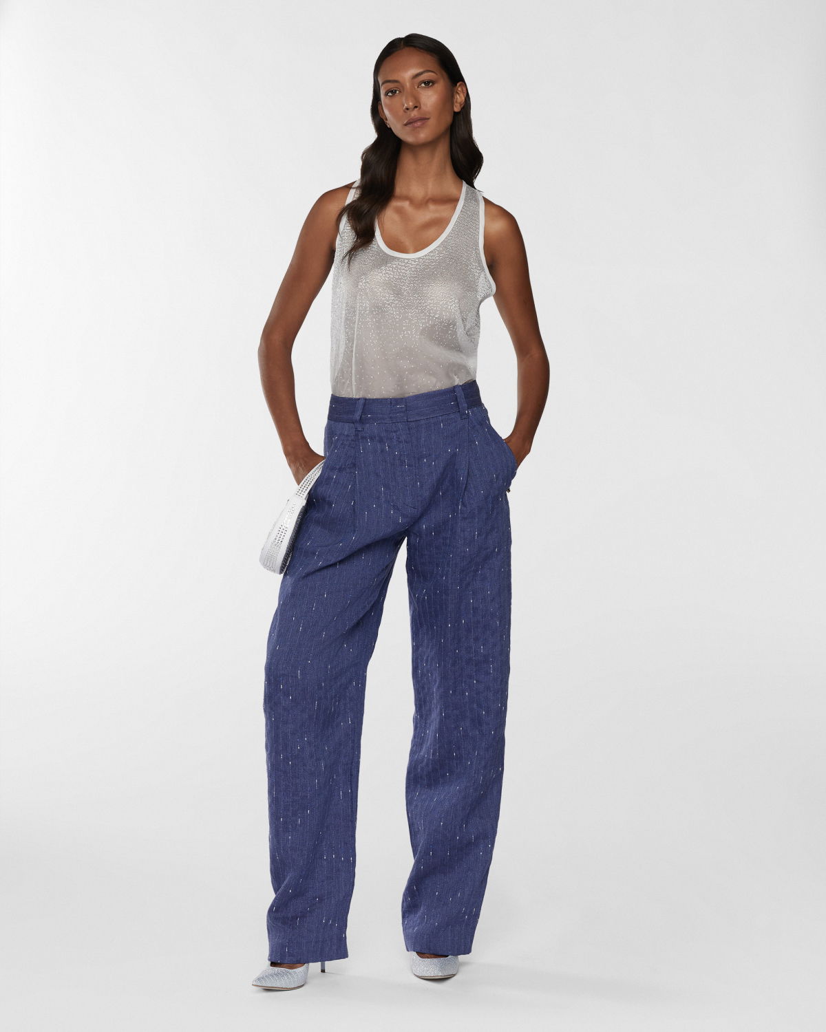 Pinstriped linen-blend pants | Resort 2025 Collection | Genny