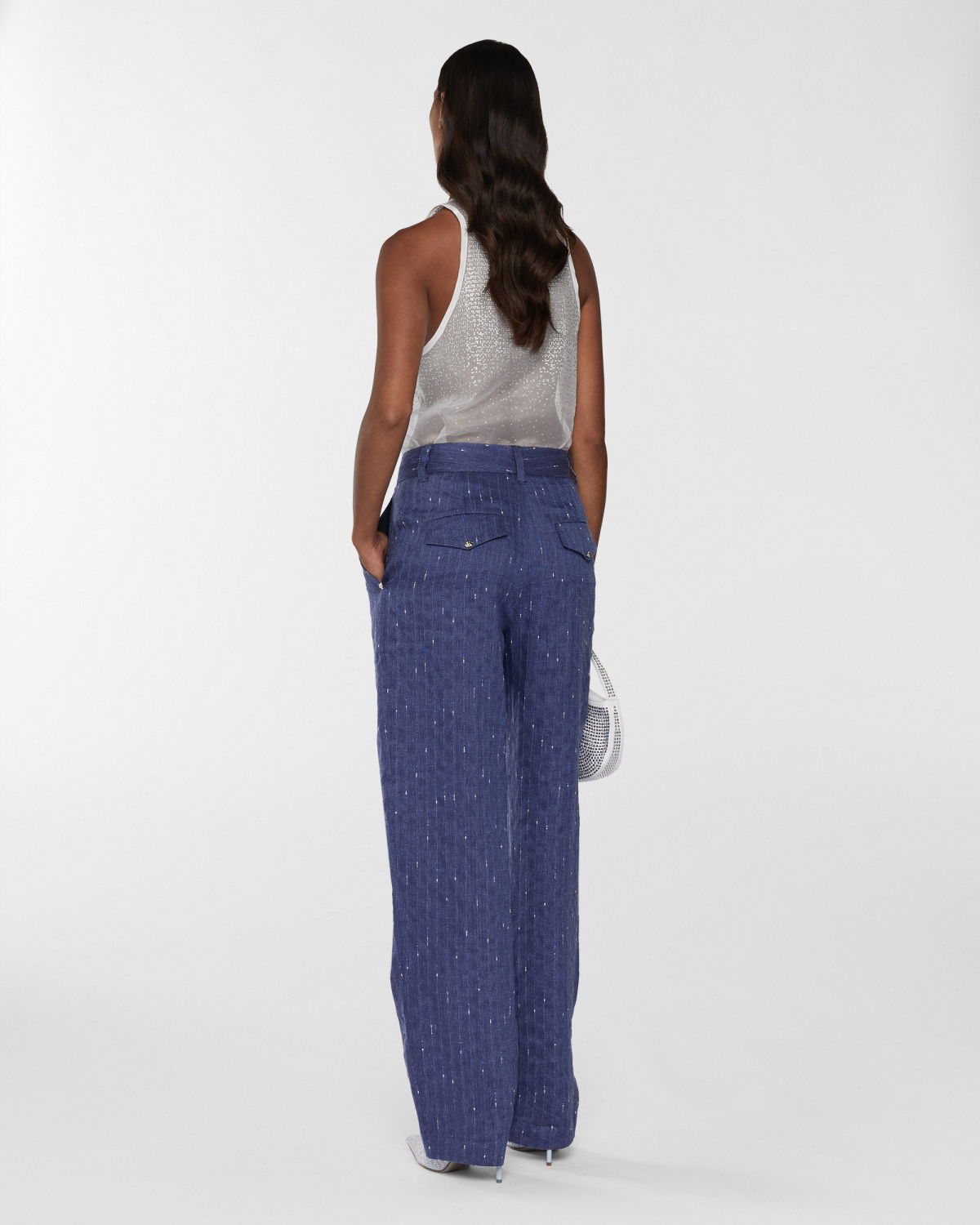 Pinstriped linen-blend pants | Resort 2025 Collection | Genny