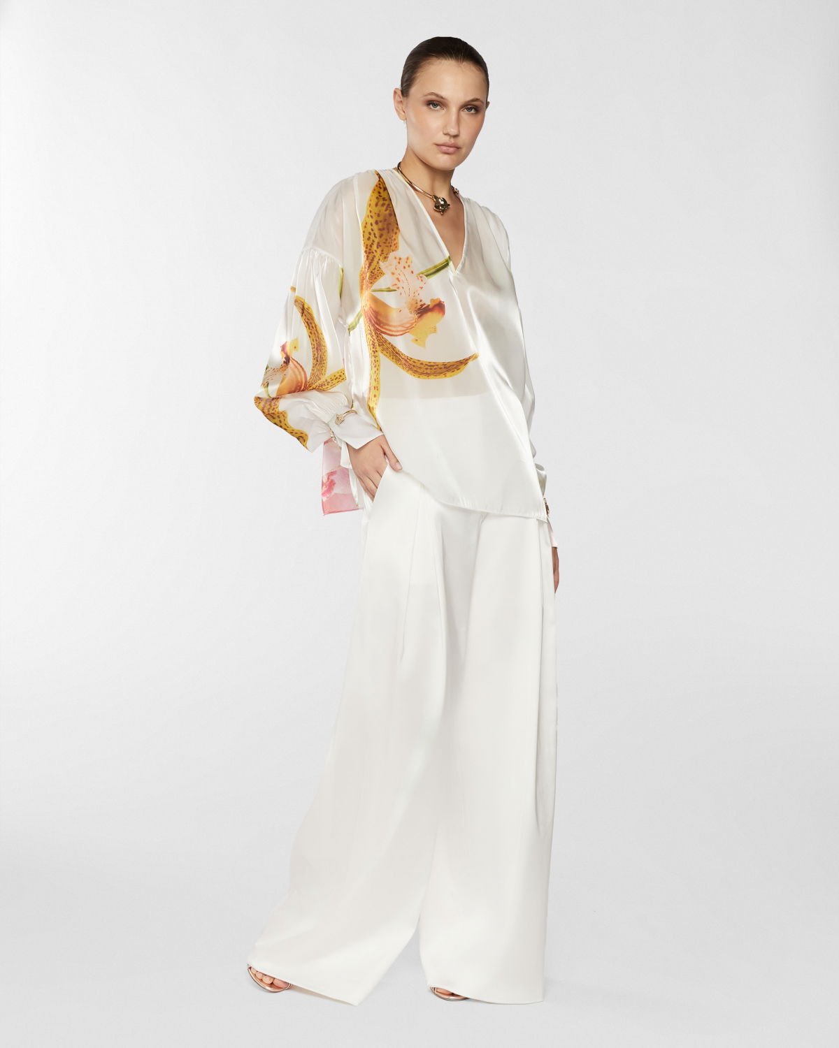 Wide satin pants with X | Resort 2025 Collection | Genny