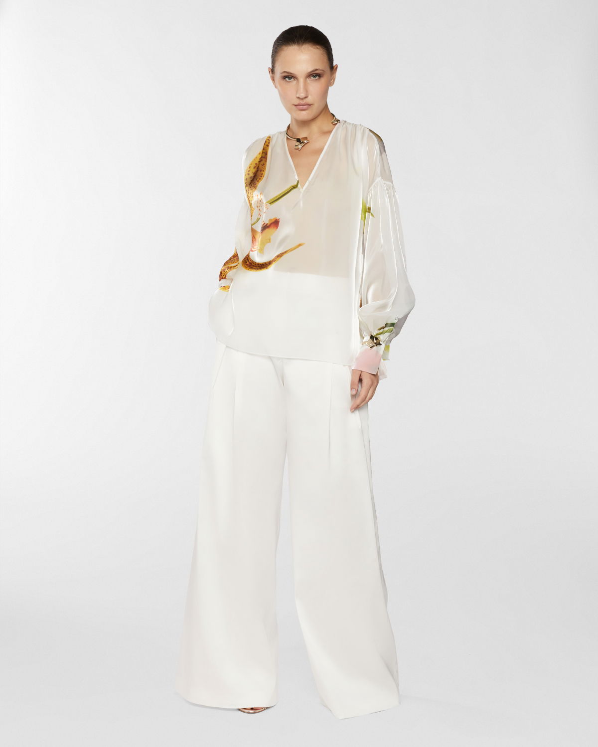 Wide satin pants with X | Resort 2025 Collection | Genny