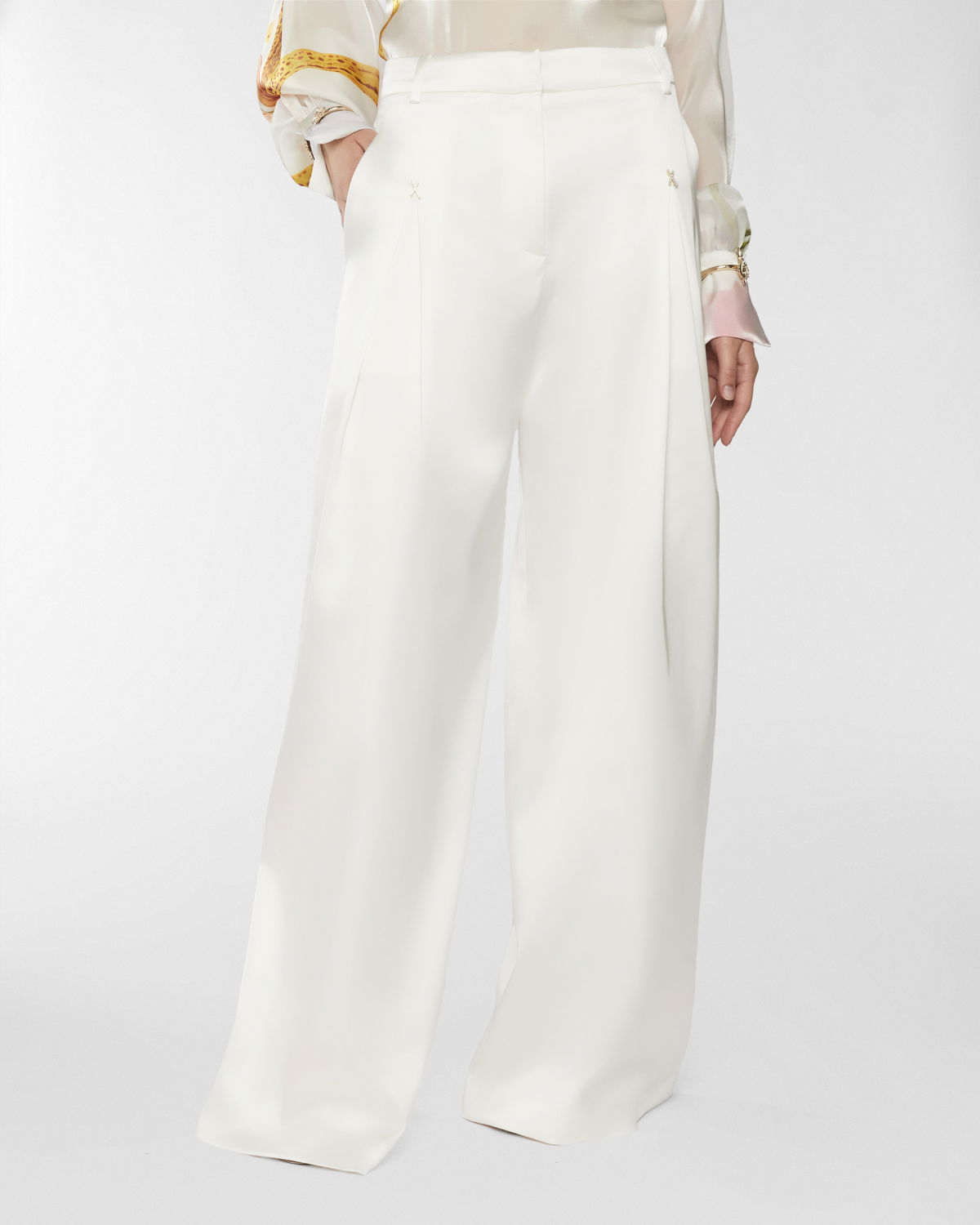 Wide satin pants with X | Resort 2025 Collection | Genny