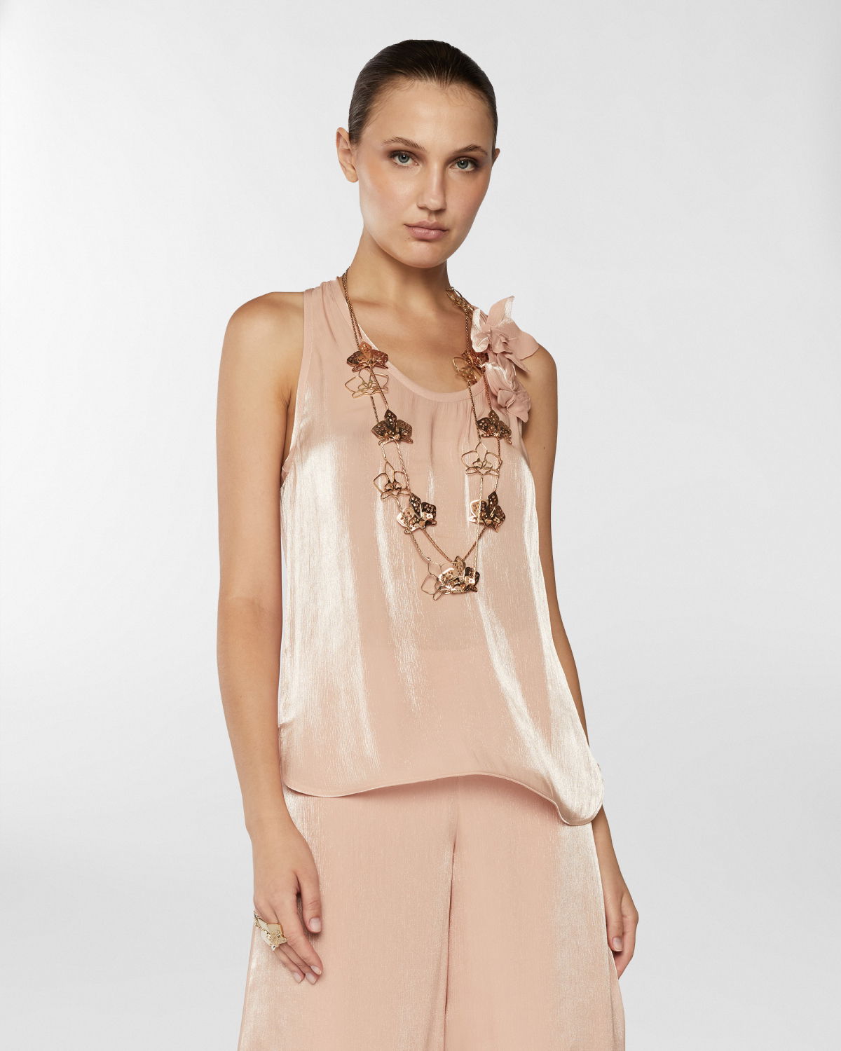 Top con Orchideee tridimensionali | Collezione Resort 2025 | Genny