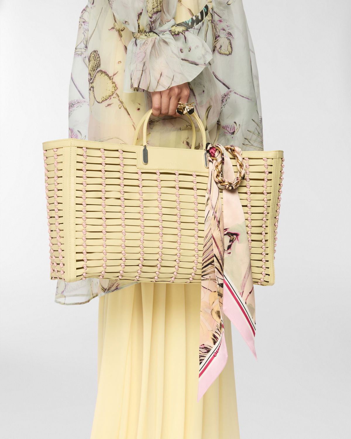 Leather bag with blockchain weave and decorative scarf | Spring Summer 2025 | Genny