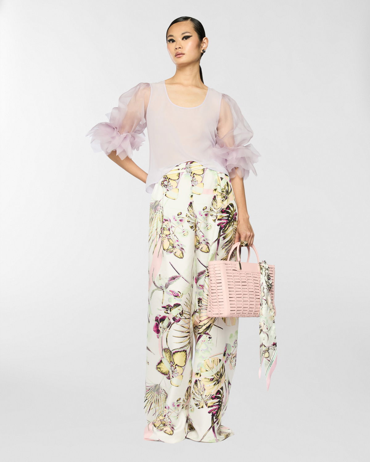 Wide trousers with jungle flower print | Spring Summer 2025 | Genny