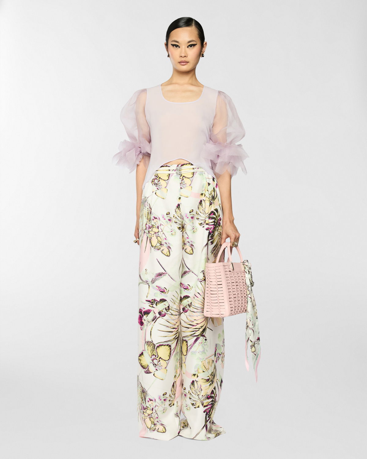 Wide trousers with jungle flower print | Spring Summer 2025 | Genny