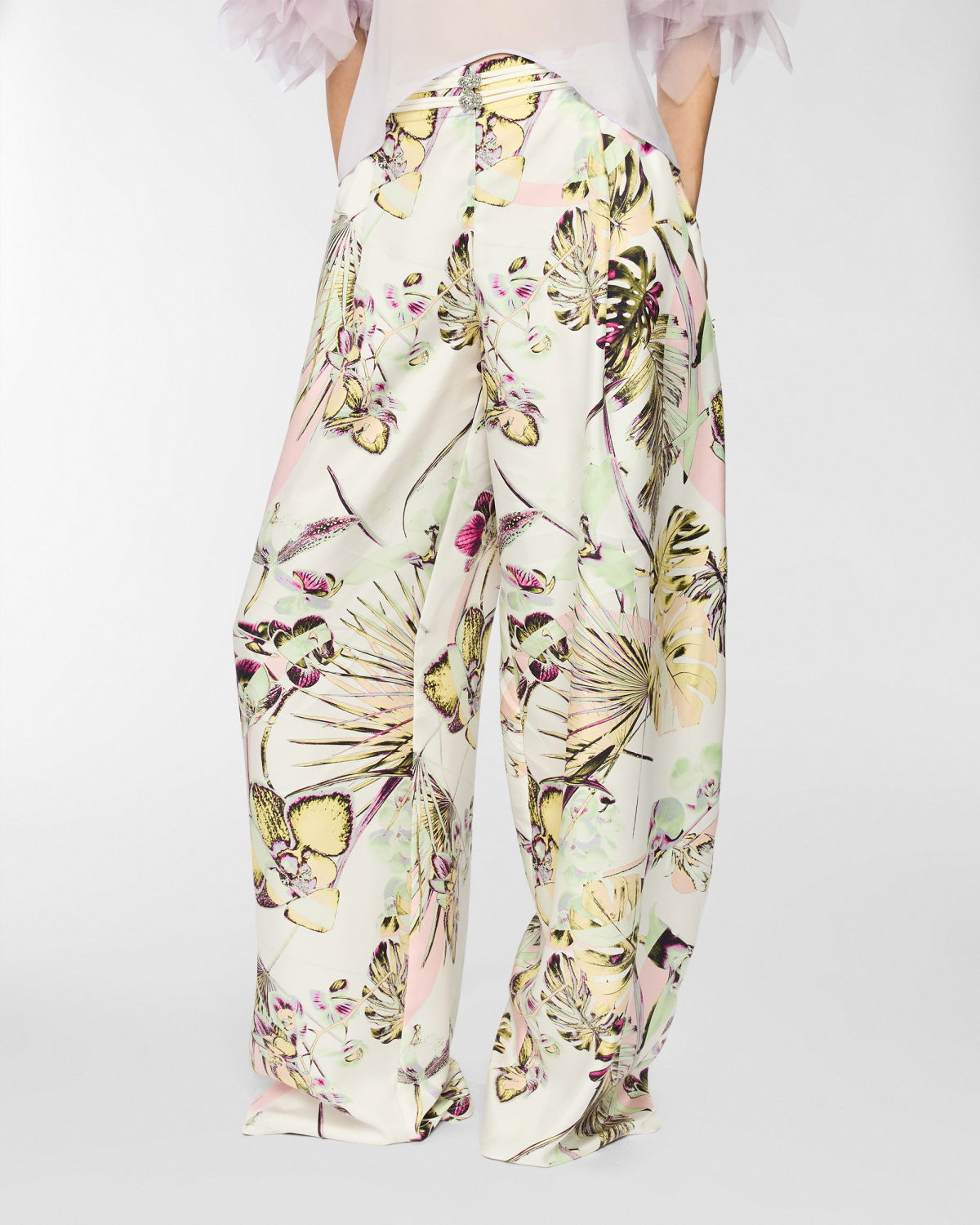 Wide trousers with jungle flower print | Spring Summer 2025 | Genny