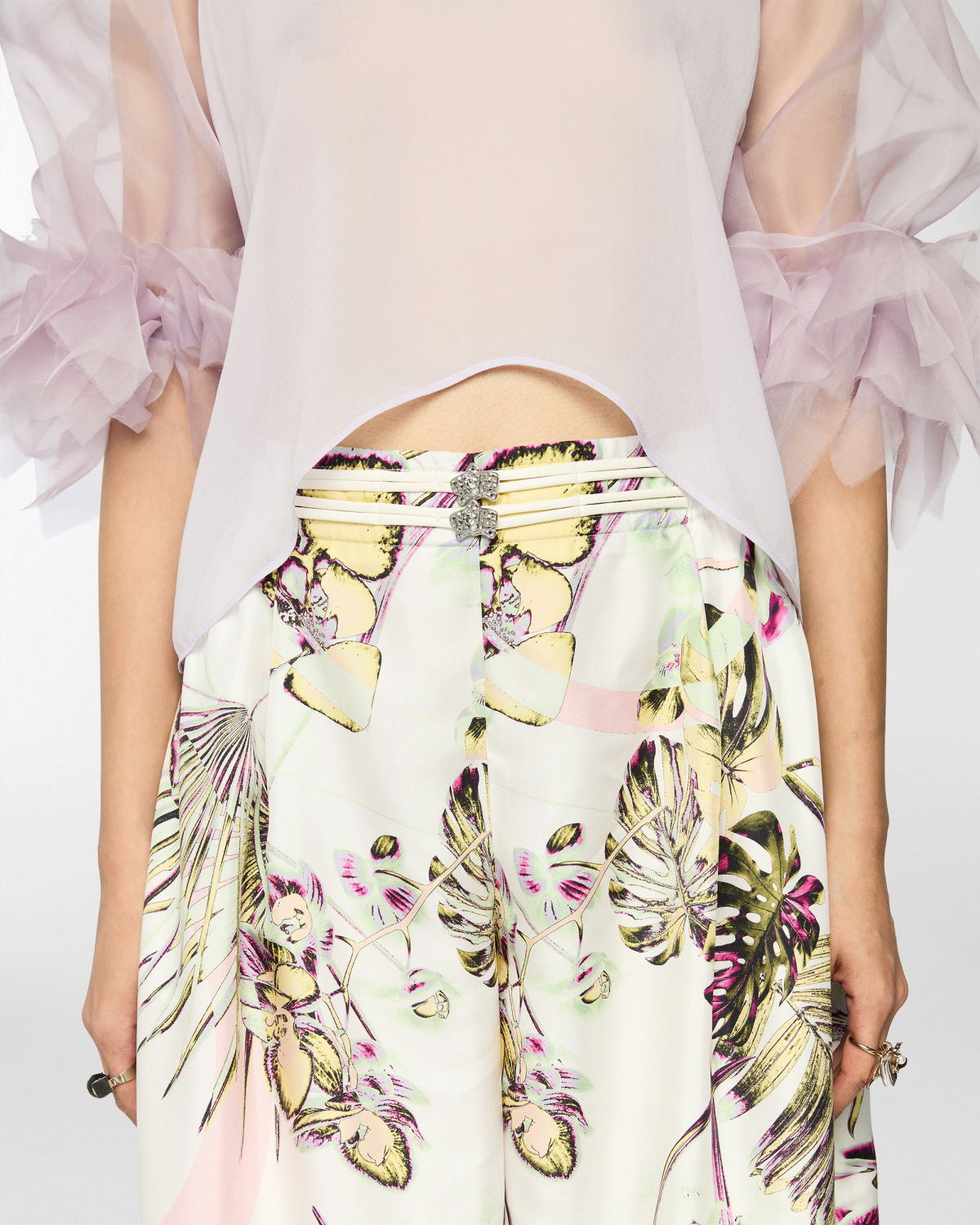 Wide trousers with jungle flower print | Spring Summer 2025 | Genny