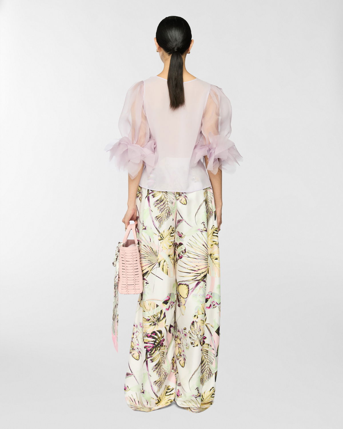 Wide trousers with jungle flower print | Spring Summer 2025 | Genny