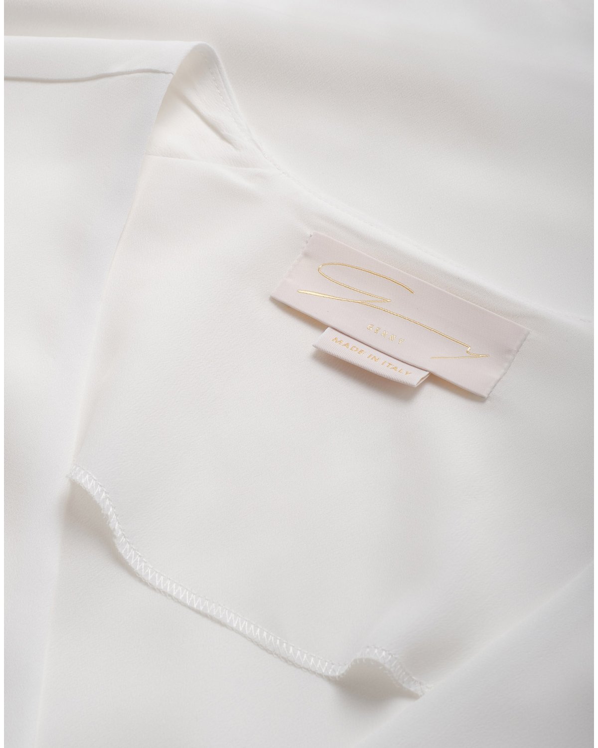 White silk-blend V-neck top | | Genny