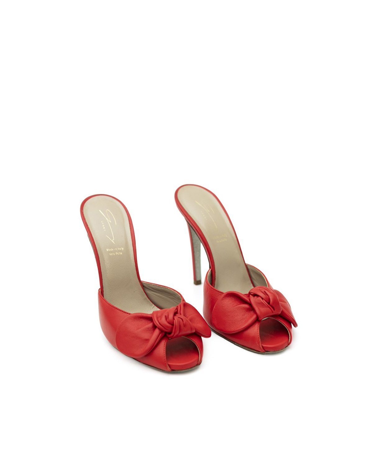 Bow-detailed red leather mules | | Genny