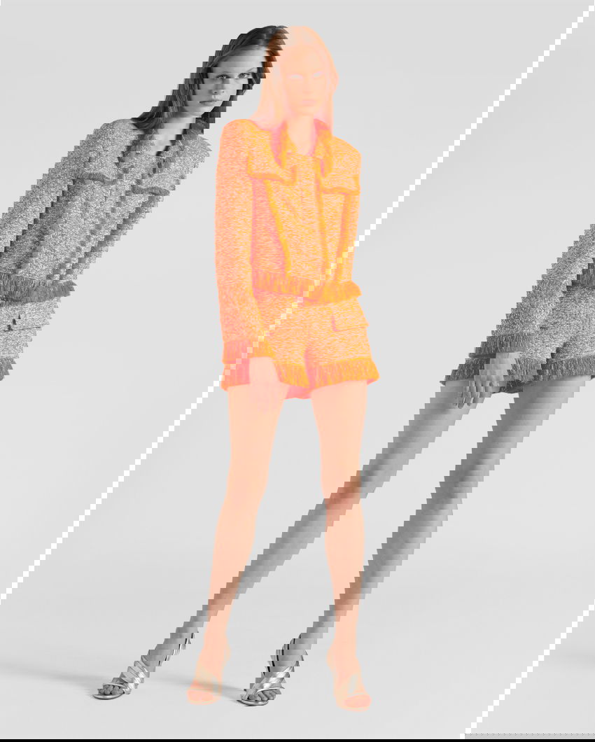 Cropped jacket with a pearl appliqué